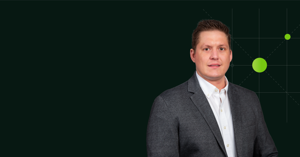 Ryan Fussner, Director of Sales for North America at Bring IT, Oracle NetSuite Partner, professional headshot in gray suit jacket
